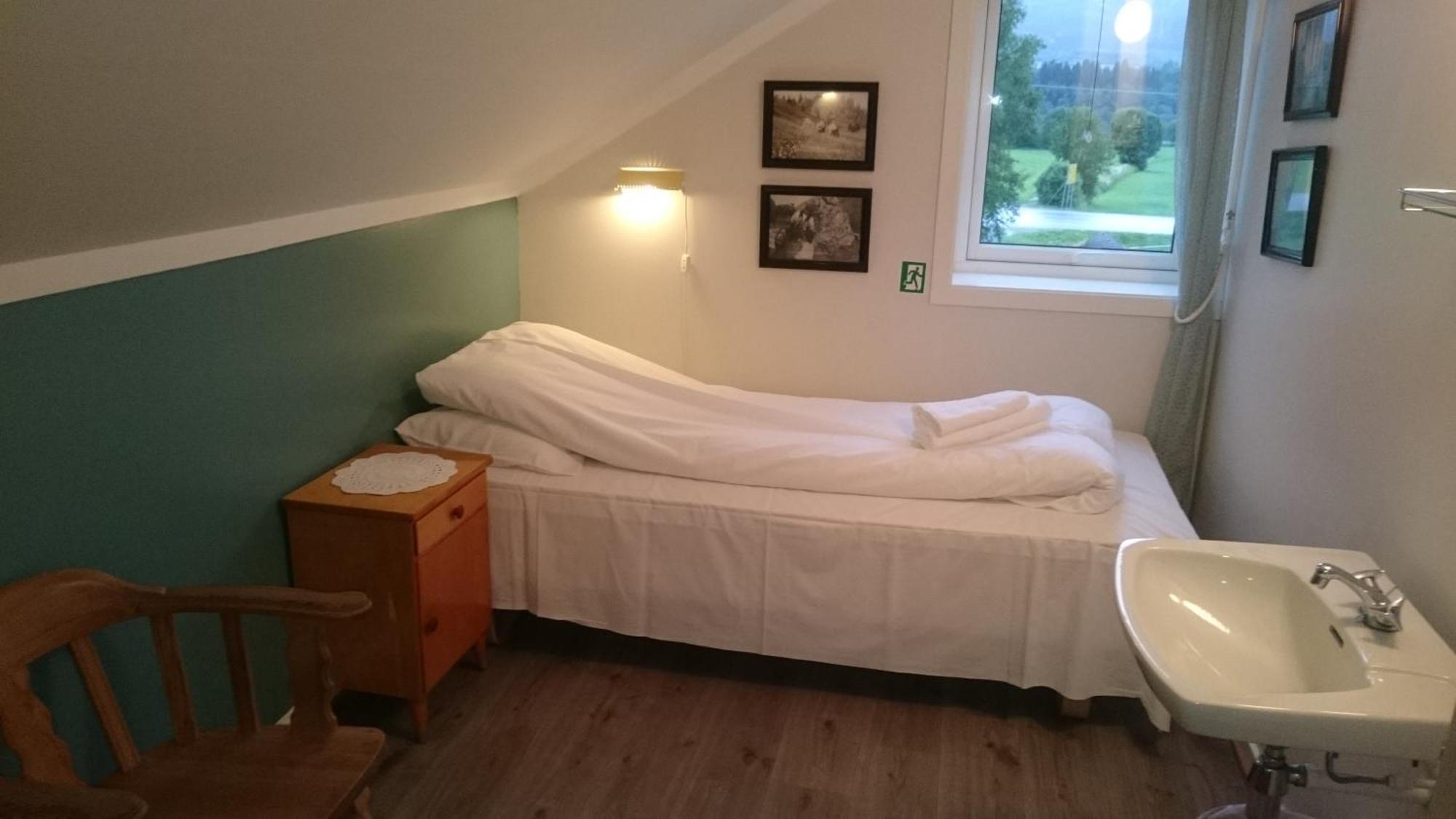 Grong Gard Guesthouse Quarto foto